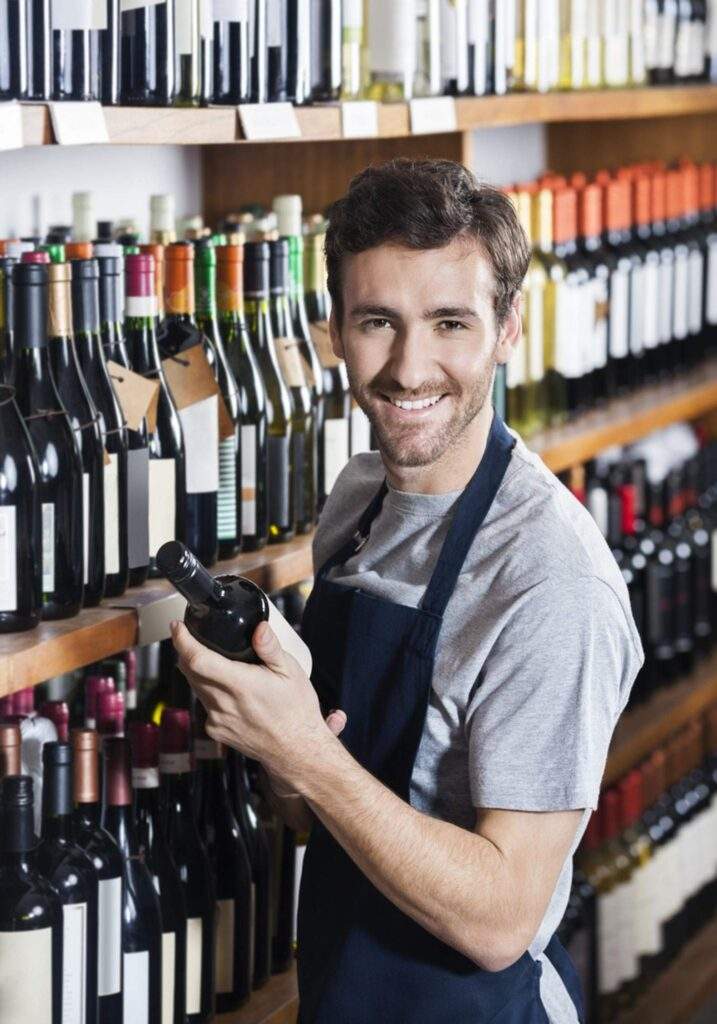wine store clerk 717x1024 - Should you sell Direct to Consumers?
